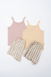 Flat lay of Avauma butter and pink check tank top sets – soft cotton sleeveless tops with matching gingham shorts